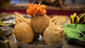 Why are coconuts and betel nuts so important in the worship of the goddess?